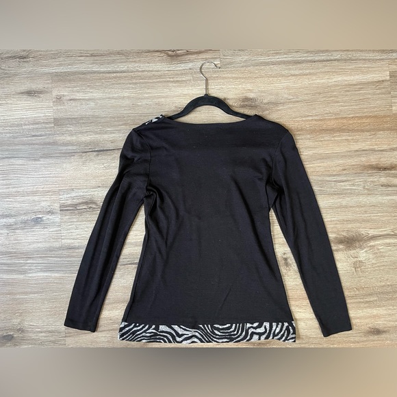 Size is 8. Solid black long sleeve shirt with design. - Picture 4 of 4
